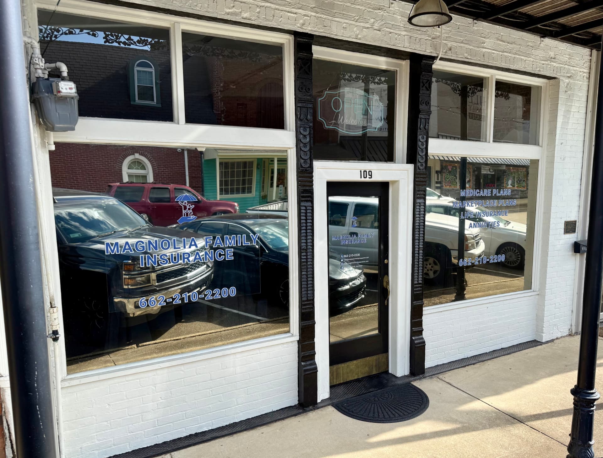 Magnolia Family Insurance storefront at 109 S Main Street, Booneville, MS — signage for Medicare, Marketplace, Life Insurance, and Annuities plans